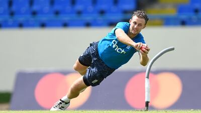 England captain Joe Root catches a ball during training. Getty