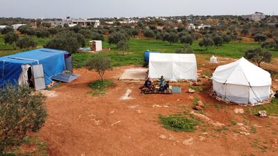 An aerial view of an encampment in the village of Harbanoush where Abderrazaq Khatoun lives with his 11 orphaned grandchildren and other family members. AFP