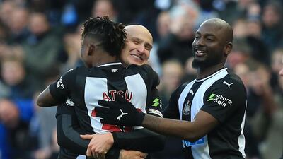 Newcastle United's English midfielder Jonjo Shelvey (C) celebrates with teammates after scoring his team's second goal. AFP