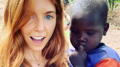 Stacey Dooley was pictured with a Ugandan child while visiting the country with Comic Relief. Instagram