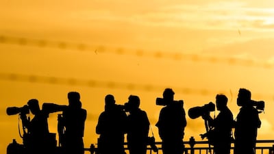 Photographers await the arrival of leaders at the Ezeiza International Airport. EPA