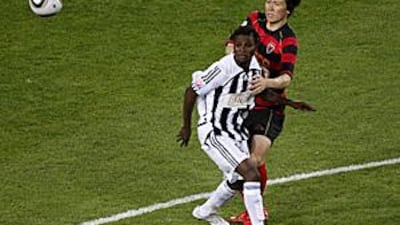 TP Mazembe's Tresor Mputu, left, was once a target of Arsene Wenger's Arsenal.