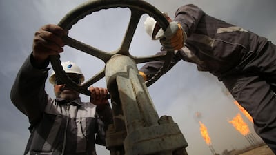 Iraqi technicians at work on oil fields. By 2040, crude will be eclipsed by the rise of the cleaner, more-efficient natural gas as the main source of energy in the Middle East. Haidar Mohammed/AFP