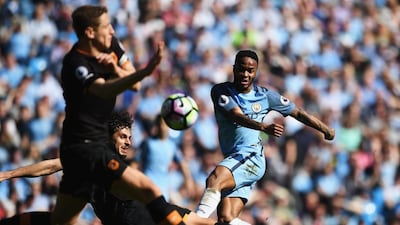 Raheem Sterling of Manchester City shoots. Shaun Botterill / Getty Images