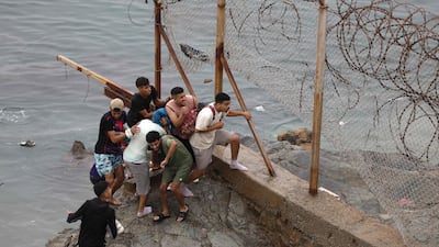 Thousands of migrants crossed overnight from Morocco into Spain's north Africa's Ceuta enclave. AFP