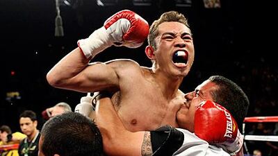 Nonito Donaire of the Philippines celebrates his victory over WBC/WBO bantamweight champion Fernando Montiel of Mexico at the Mandalay Bay Events Center in Las Vegas, Nevada.