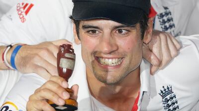 Alastair Cook holds up the Ashes Urn during the presentation ceremony after the end of the fifth day of the fifth Ashes cricket Test against Australia at the Oval in 2013. AP Photo