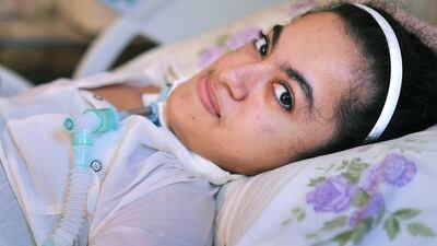 Yusra Al Hattali, who was born with a motor neuron disease that led to chronic respiratory failure, has begun an English-language course at Zayed University to prepare for a four-year Bachelor of Arts degree course in art at the university. Delores Johnson / The National