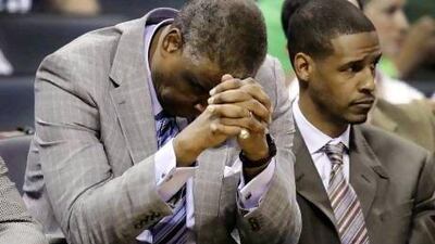 Paul Silas, left, the Charlotte Bobcats head coach, lowers his head during their defeat to an understrength Boston Celtics side on Sunday. Chuck Burton / AP Photo