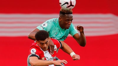Southampton's midfielder Che Adams vies for the ball with Everton's defender Yerry Mina. AFP