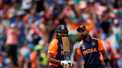 Not all is reportedly well between senior India players, Rohit Sharma, left, and Virat Kohli. Andrew Boyers / Reuters