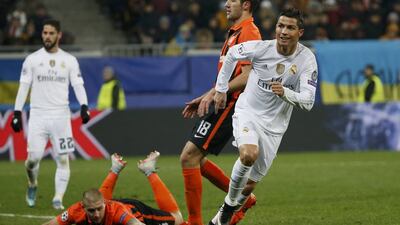 Cristiano Ronaldo, right, scored twice as Real Madrid won 4-3 at Shakhtar Donetsk. Gleb Garanich / Reuters