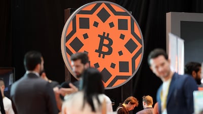 Visitors at Bitcoin Mena held in Abu Dhabi this week. Digital currencies enjoy a high profile in the UAE, an emerging crypto hub. Pawan Singh / The National