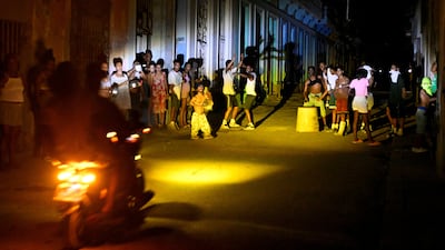 People gather on a street during a blackout in Havana, as Cuba's national electric grid collapsed, according to the country's grid operator, leaving around 10 million people without power. Reuters