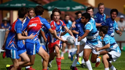 Two teams in action at the HSBC Rugby Festival at the Sevens Stadium on January 28, 2017 in Dubai, United Arab Emirates. Getty Images