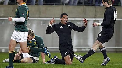 New Zealand's Mils Muliana celebrates after touching down against South Africa at Westpac Stadium.