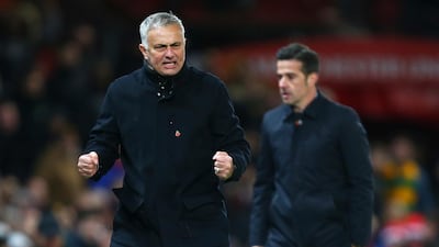 Manchester United manager Jose Mourinho reacts, next to Everton manager Marco Silva, right, during the last minutes of the match. AP Photo