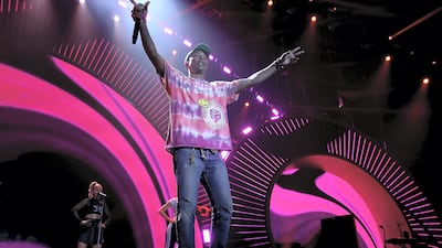 Pharrell Williams performs on stage at the Global Citizen Festival G20 benefit concert at the Barclaycard Arena in Hamburg, northern Germany last year. This week he was criticised for performing his song 'Happy' at a fundraising event for the Israel Defence Forces. AFP