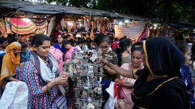 People throng a market ahead of Navratri in Ahmedabad, India. AP