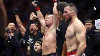 Petr Yan has his hand raised in victory after taking a unanimous decision over Merab Dvalishvili at UFC 333 in Abu Dhabi. Chris Whiteoak / The National