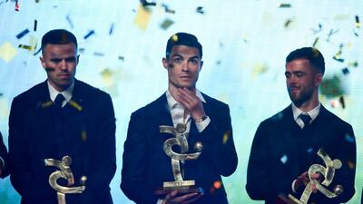 Josip Ilicic, Cristiano Ronaldo and Miralem Pjanic on stage at the Gran Gala del Calcio 2019 ceremony. AFP
