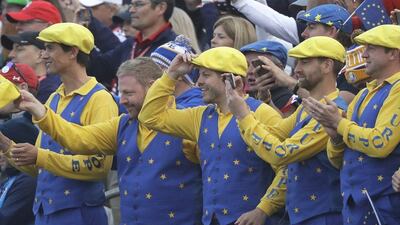 Europe fans cheer during a foursome match at the Ryder Cup golf tournament. David J Phillip / AP Photo