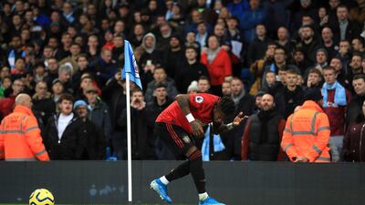 Manchester United's Fred reacts after objects are thrown at him during the English Premier League soccer match at the Etihad Stadium, Manchester, England on December 7, 2019. Mike Egerton / PA via AP