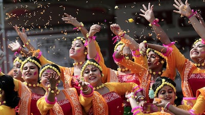 Indian students perform a dance to a Tagore song as they celebrate the Holi festival at Tagore University in Kolkata, eastern India. The Rabindra Bharati University organized the festival of colors at their campus. Holi is an ancient Indian festival to mark the arrival of spring. EPA