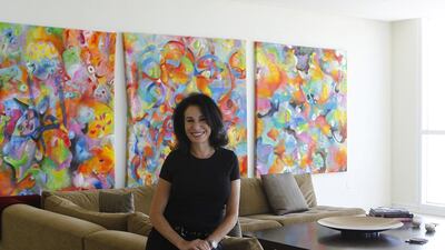 Pushing through the pain: Dubai artist Elise Vazelakis initially resisted seeking help when she felt pain and swelling in her fingers. Jeffrey E Biteng / The National