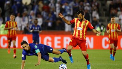 Esperance Sportive de Tunis' Taha Khenissi in action with Al Hilal's Carlos Eduardo. Reuters