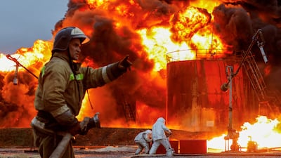 Firefighters work to extinguish a blaze after shelling at an oil terminal in the town of Shakhtarsk near Donetsk, in the Russian-controlled region of Ukraine. Reuters