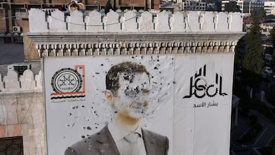 A bullet-riddled portrait of Syrian President Bashar Al Assad in Hama. Fears are growing that the Islamist offensive could result in a failed state in Syria. AFP
