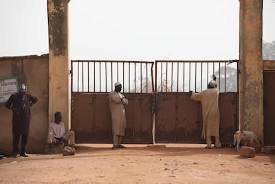 Parents wait for news outside the Government Science Secondary school in Kankara, in northwestern Katsina State, Nigeria. AFP.