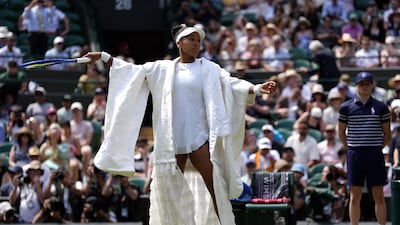 Naomi Osaka sported this kimono-inspired white robe ahead of one her matches at the 2026 Wimbledon Championships. Getty Images
