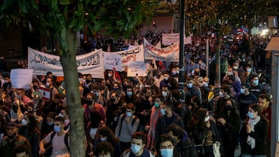 Students from different universities carry placards, wave Lebanese flags during a demonstration under the slogan of 'A Day of Student Rage' in Al-Hamra, Beirut. EPA