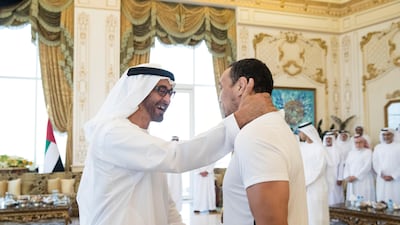 Sheikh Mohammed bin Zayed, Crown Prince of Abu Dhabi and Deputy Supreme Commander of the UAE Armed Forces, welcomes Faisal Al Ketbi home, after he won a gold and silver medal in Jiu-Jitsu at the World Games in Poland. Ryan Carter / Crown Prince Court - Abu Dhabi