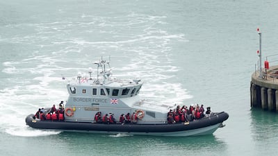 Migrants are taken into Dover, Kent, on a Border Force vessel, after a small boat incident in the English Channel, on May 2. PA