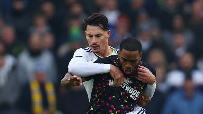 Brentford's Ivan Toney tussles with Leeds United's Robin Koch. Reuters