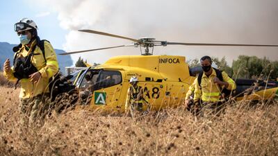 Authorities said the area's rugged terrain made extinguishing the flames difficult. AP