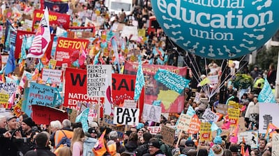 Striking teachers from the National Education Union march to a rally in Trafalgar Square, central London. PA