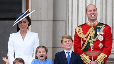 Prince William and his wife Kate with their children Prince Louis, Princess Charlotte and Prince George on the balcony of Buckingham Palace at the queen's platinum jubilee celebrations. AFP