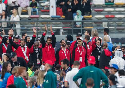 Athletes arrive for the closing ceremony. Victor Besa / The National