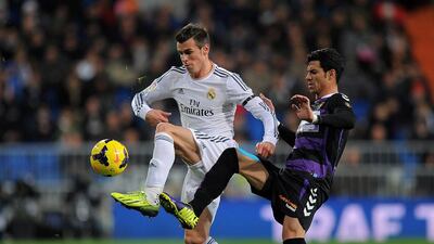 Being able to sign high quality and expensive players such as Gareth Bale, left, is one of the reasons Real Madrid and Barcelona are the 'biggest clubs in the world', says Fernando Sanz, general director for the Primera Liga's office in Dubai, the league's first outside of Spain. Denis Doyle/Getty Images