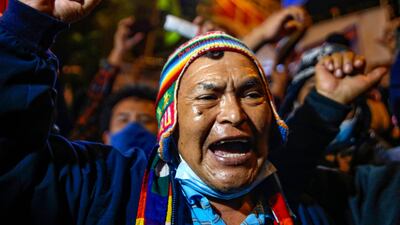 A supporter of Leftist school teacher Pedro Castillo celebrates in dowtown Lima following the official proclamation of him as Peru’s president-elect.