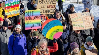 People take part in a demonstration against racism and far-right politics, in Erfurt. AFP