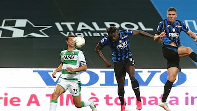 Atalanta's Duvan Zapata heads home the fourth goal. EPA