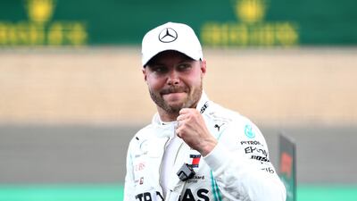 Pole position qualifier Valtteri Bottas celebrates at Silverstone on Saturday. Mark Thompson / Getty Images