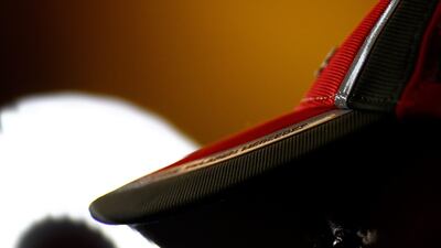 Lewis Hamilton watches from the pitlane after second practice. Vladimir Rys/Getty Images