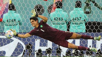 Morocco goalkeeper Bono saves from Sergio Busquets of Spain during the penalty shoot-out. EPA