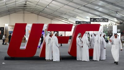 People gather at the UFC fan zone. Yas Island, Abu Dhabi. Chris Whiteoak / The National